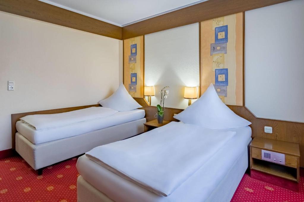 Die Betten eines Twin-Zimmers im Aspire Oldenburg