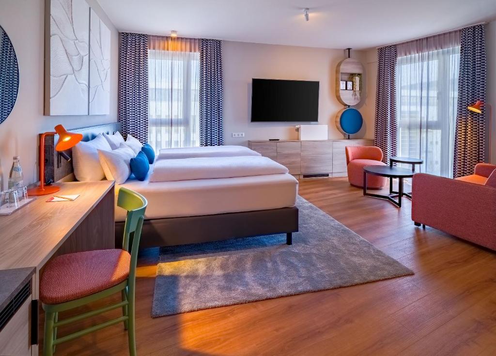 Die Ausstattung des Doppelzimmers im Ramada Encore by Wyndham Munich Messe