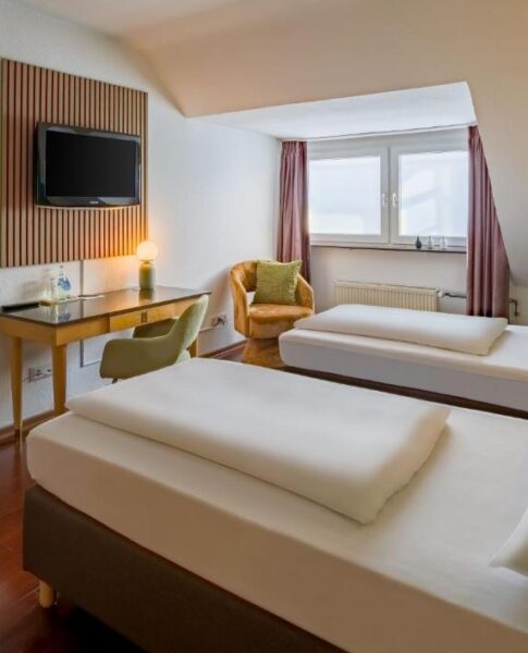 Das Twin-Zimmer mit Einzelbetten im rugs Hotel Düsseldorf