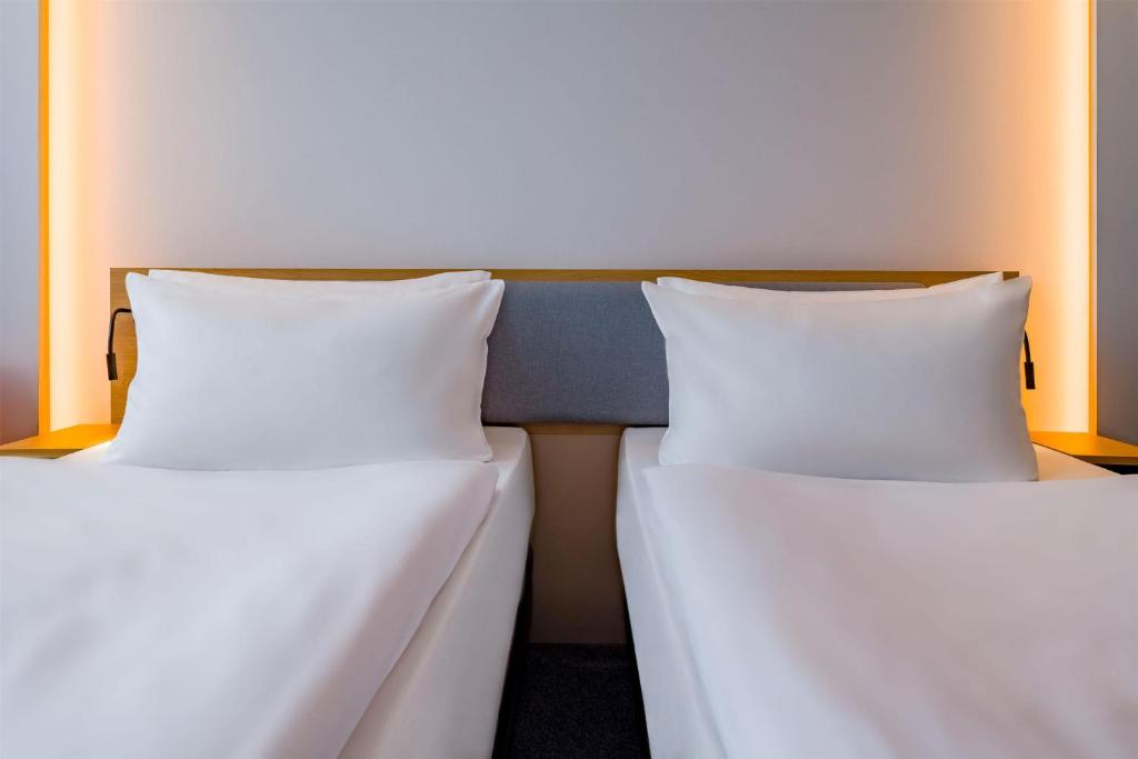 Zwei gemütliche Betten direkt nebeneinander